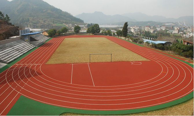 Thi công đường chạy điền kinh sân vận động Sơn La